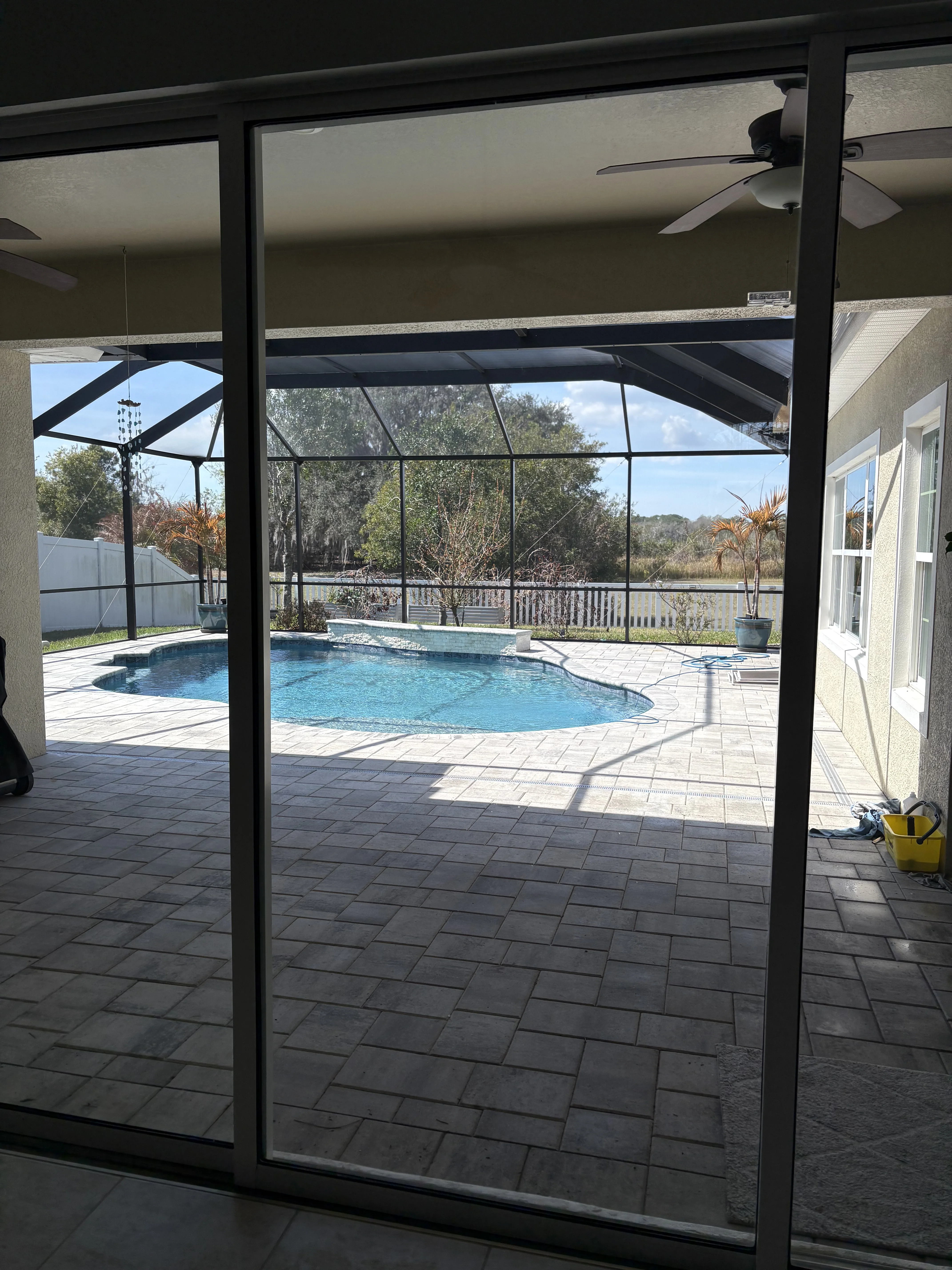 Residential patio doors shining by Tampa Bay Shine