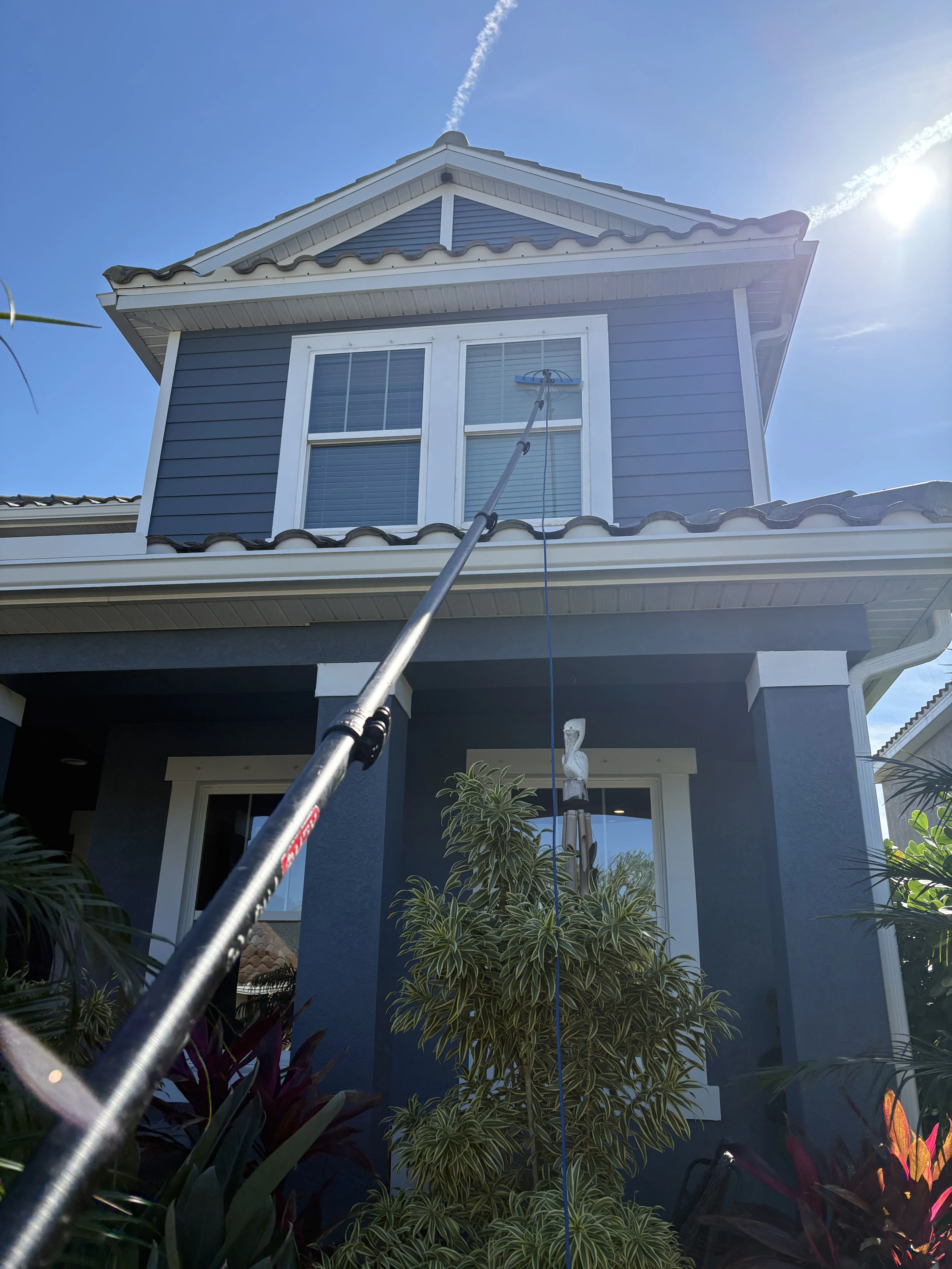 Efficient second story window cleaning by Tampa Bay Shine