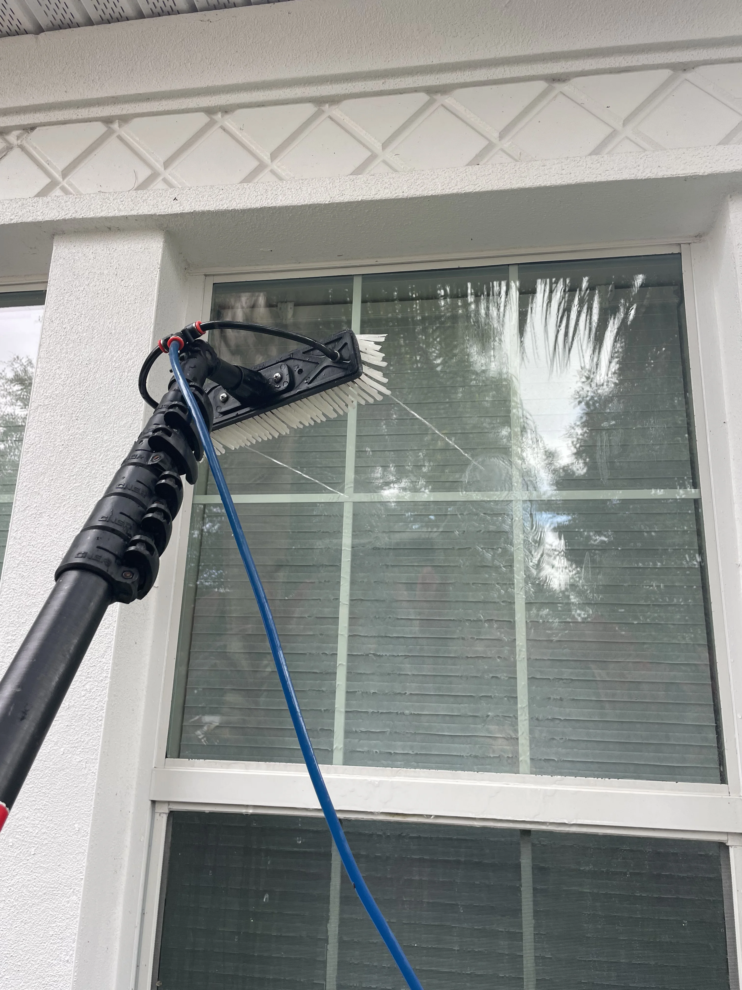 Window cleaning detail by Tampa Bay Shine