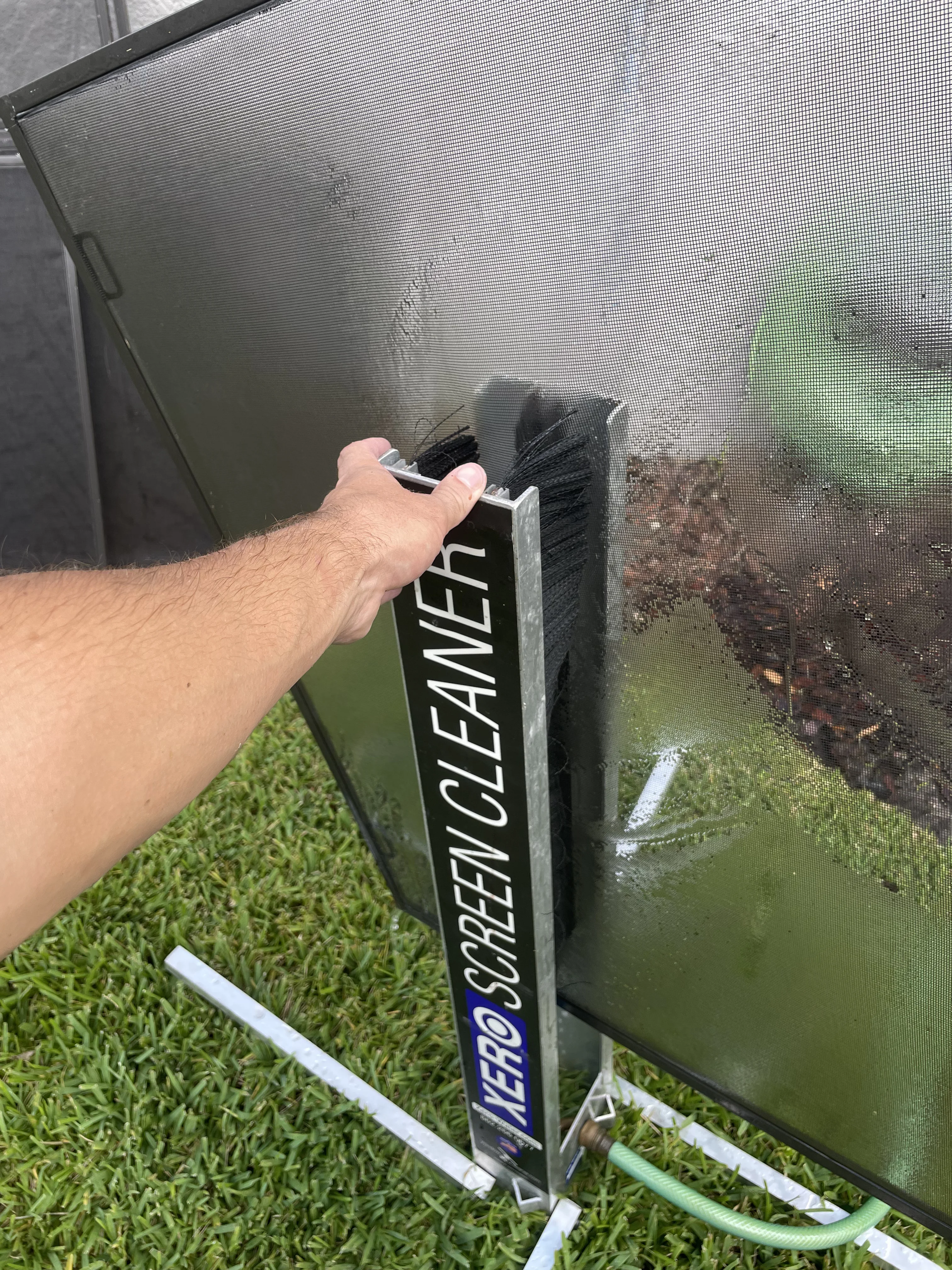 Professional screen cleaning by Tampa Bay Shine